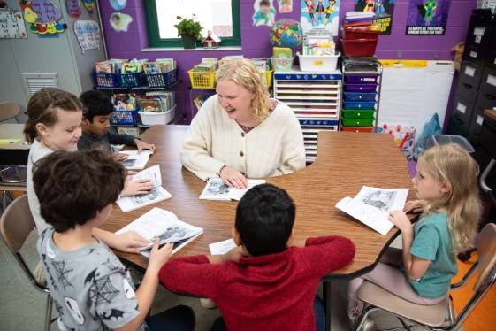 A student teacher with students