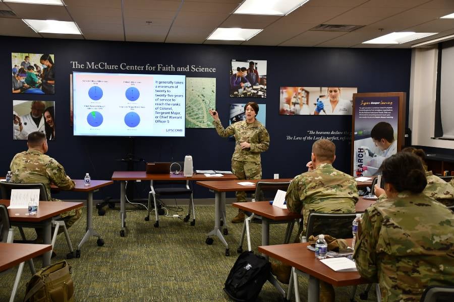 A member of the Tennessee National Guard cohort makes a final presentation.