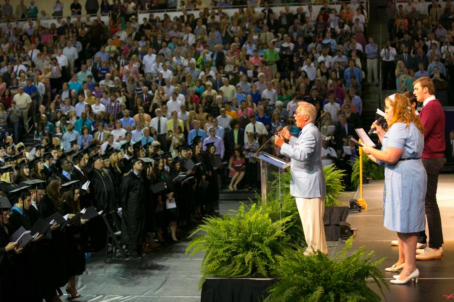 Alum Pat Boone leads the Lipscomb alma mater, which he wrote, during May 2015 commencement.