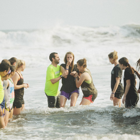 Student is baptised in waters of the Pacific Ocean in El Salvador.