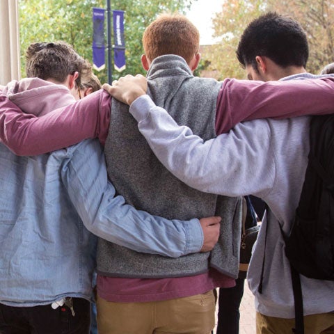 Image of students participating in "On the first day we pray."