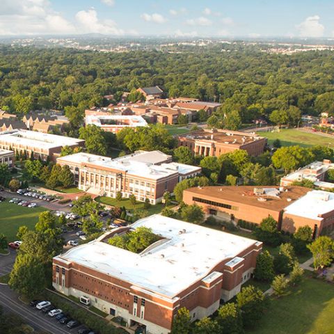 Aerial shot of main campus with Nashville skyline in the background.