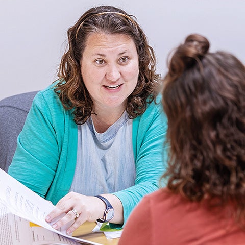 Staff helping student