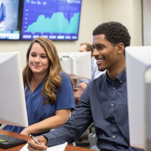 students working on computers together