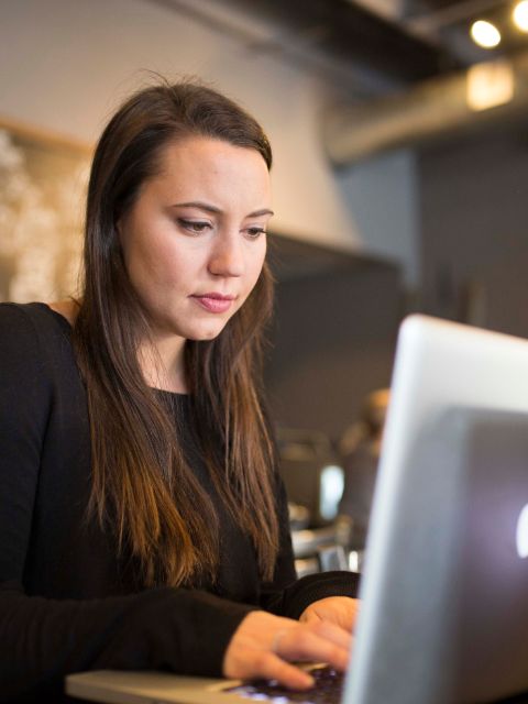 Woman sitting at computer