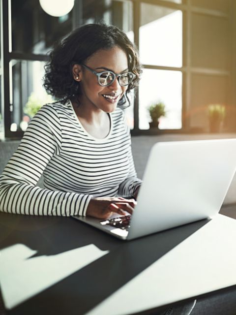 Woman sitting at computer