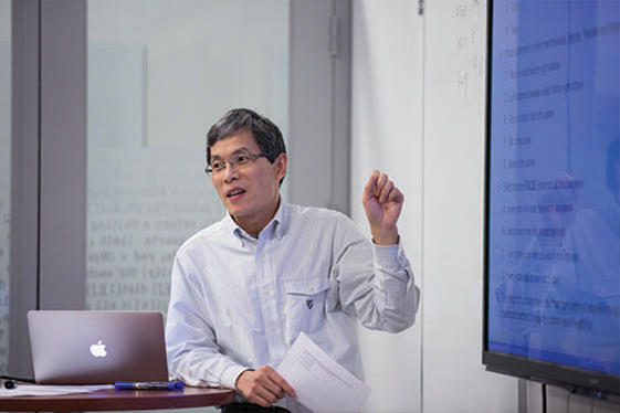 A professor teaches class