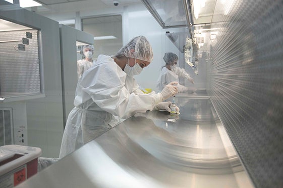 A pharmacy student works in the lab