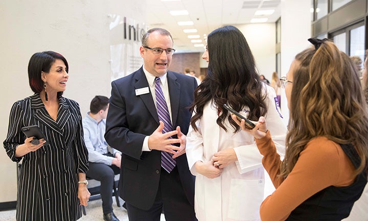 A PA student after the white coat ceremony