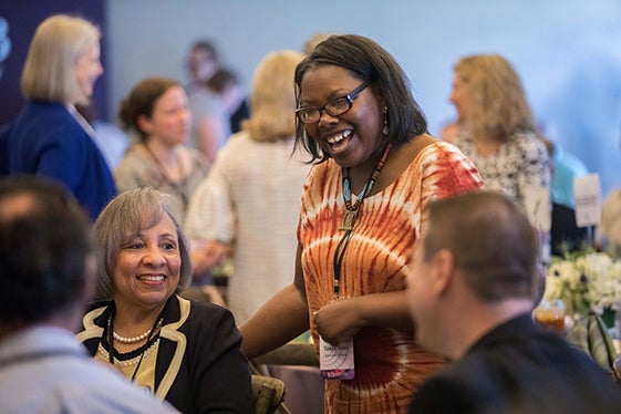 People interact at Christian Scholars Conference