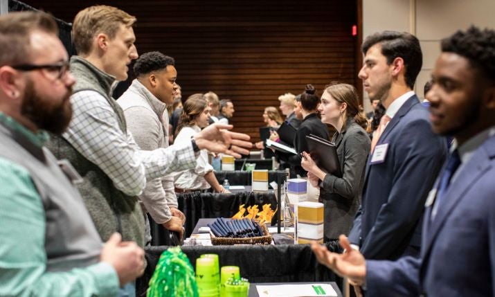 students and employers meeting at event