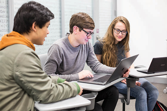 Students studying on the computer together