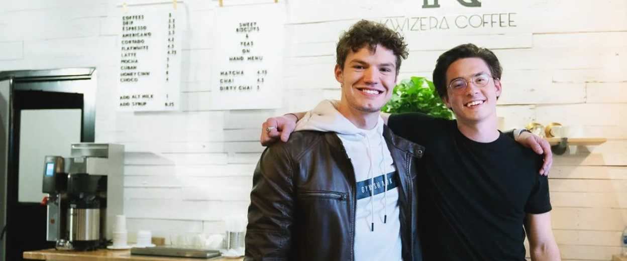 two CEI students in their coffee shop