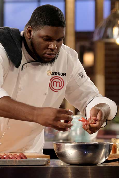Gerron Hurt, second from left, stands with judges Aarón Sanchez, Joe Bastianich and Gordon Ramsay after winning Season 9 MasterChef competition.