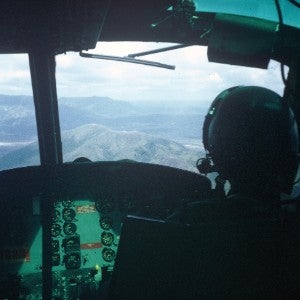 A view from a helicopter flying over Vietnam.