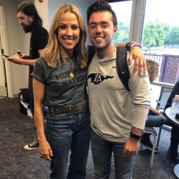 Patrick Carpenter and Sheryl Crow standing together