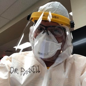 Dr. James Parnell dressed in personal protective equipment