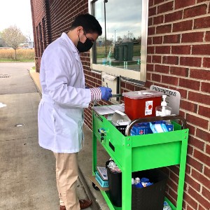 Pharmacy student preparing Covid vaccines
