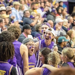 Lipscomb fans reacting in joy at a past Homecoming basketball Ggme