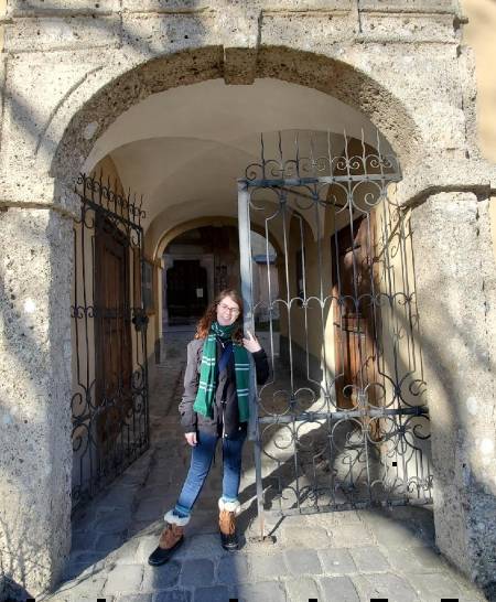 Kayla Gray in front of the Sound of Music gate.