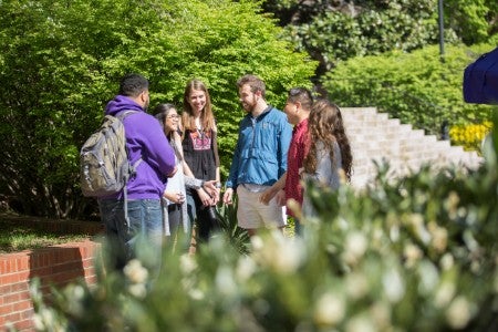 Students standing in Bison Square. 