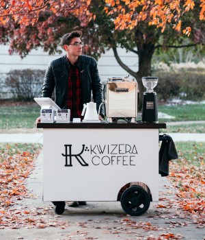 Student Aidan Miller with his Kwizera Coffee cart