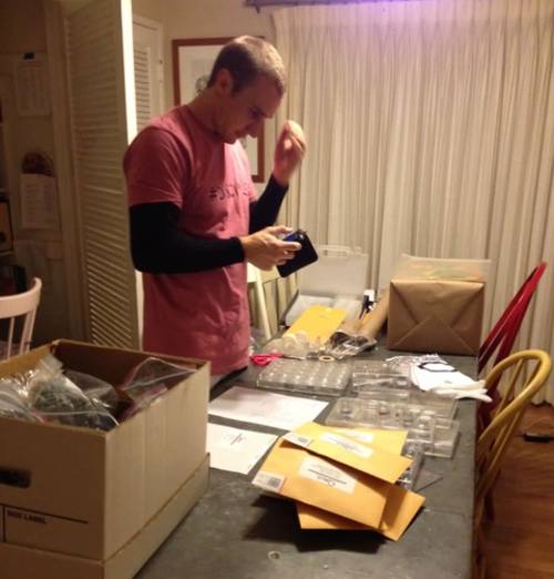 Kc Holiday packing rings into envelopes
