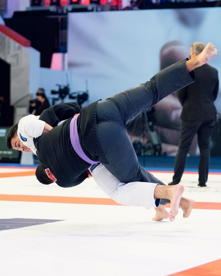 Joao wrestles with an opponent