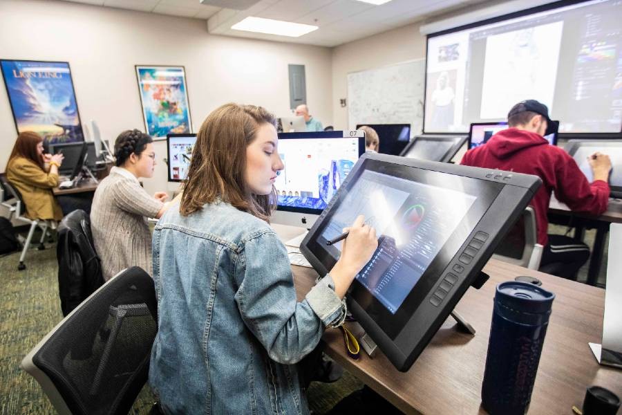 Students working in animation classroom