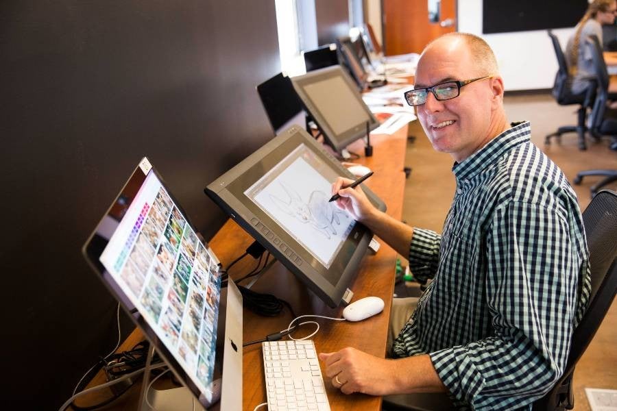 TOM BANCROFT IN HIS CLASSROOM ON LIPSCOMB CAMPUS