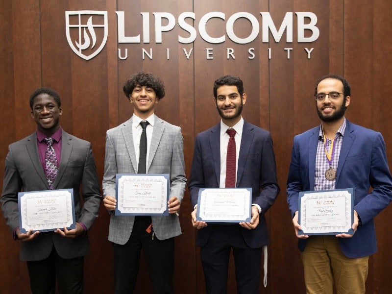 Paul Agaiby, Tony Khalil, Kenneth Klutse, Antouious Mikaael holding certificates