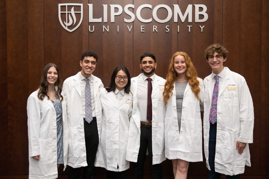 Research fellows in white coats