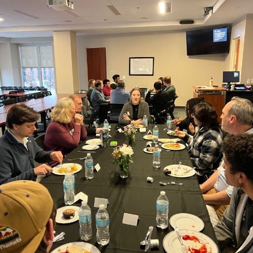 Students eating lunch together at ACM