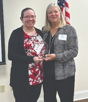 Kelsey Swerdfeger receiving the John Glenn Award