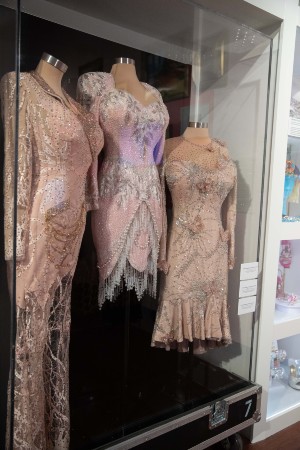 Three of the dresses in the exhibit.