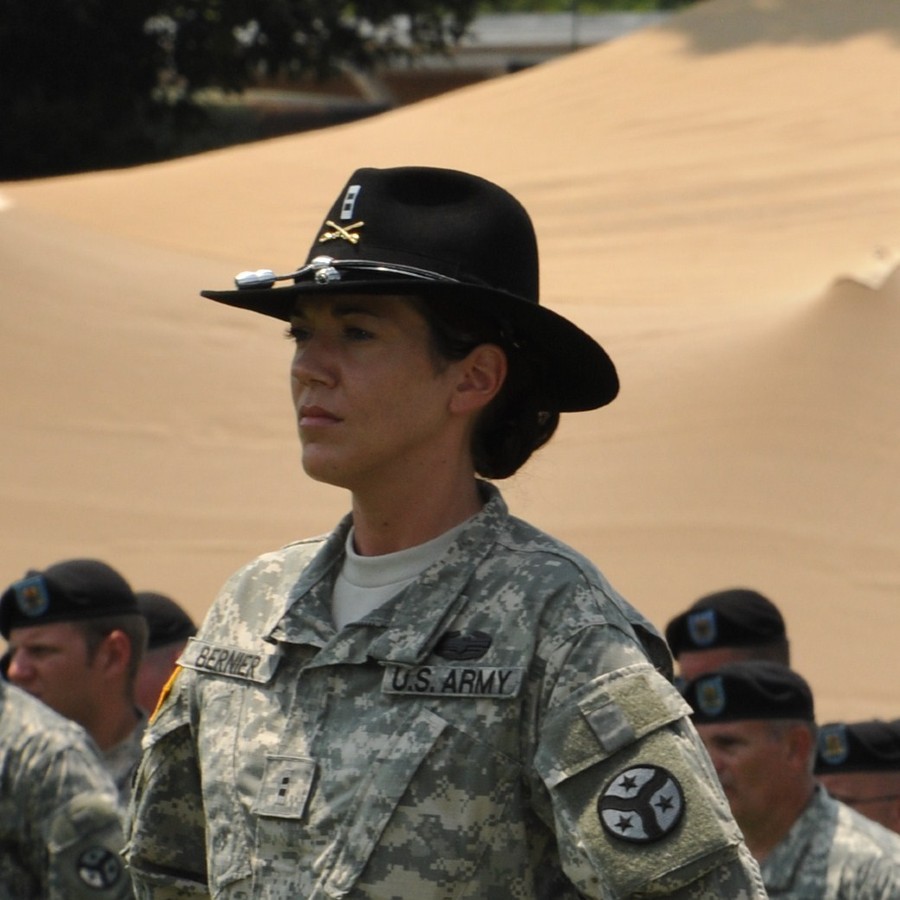 Bernier in army uniform with other soldiers in background