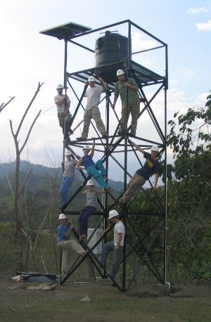 2004 student team on water tower in Honduras