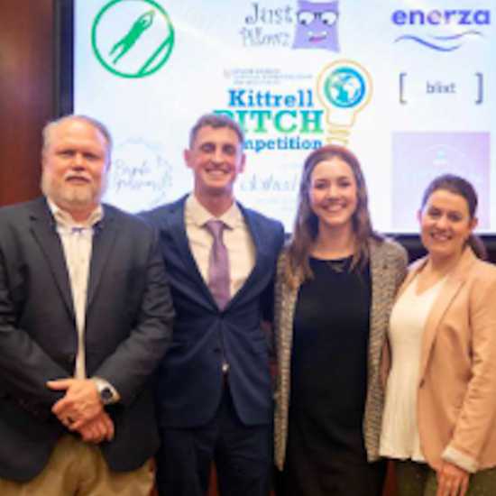 students and professor at the Kittrell Pitch Competition