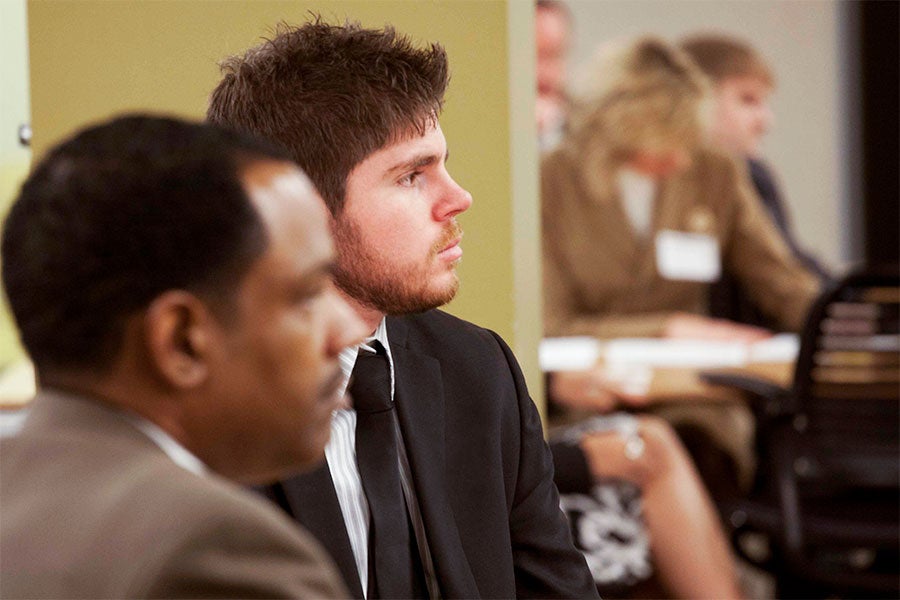 Pre-Law students listening during a lecture.