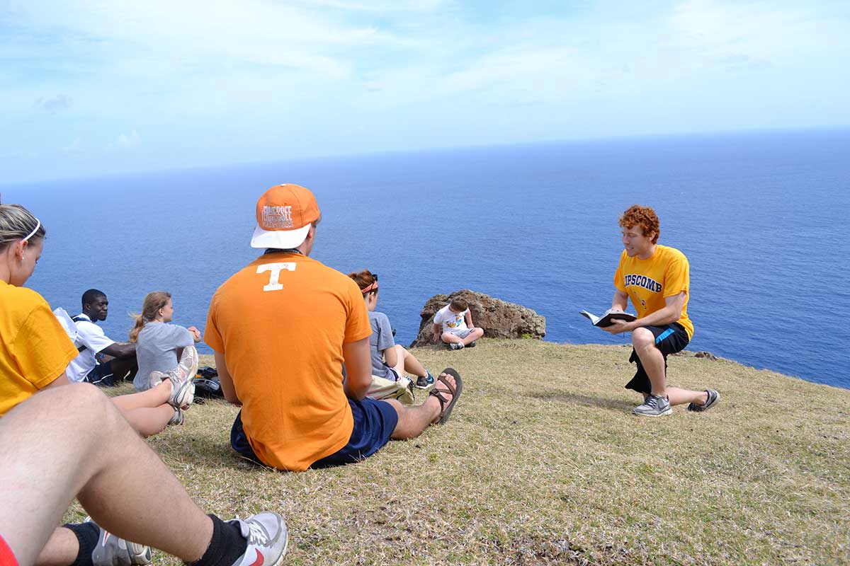 Students delve into the word while on mission.