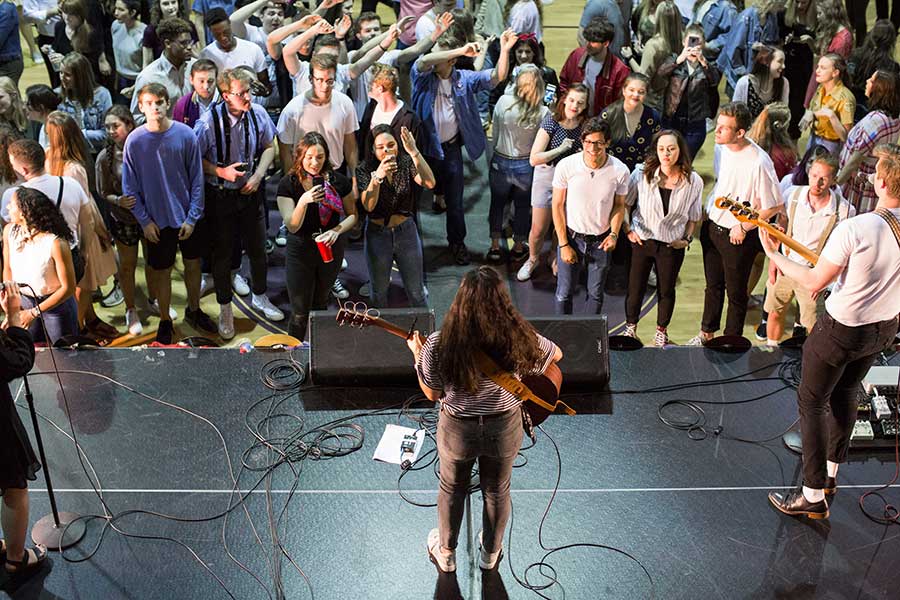 Students enjoy a performance 