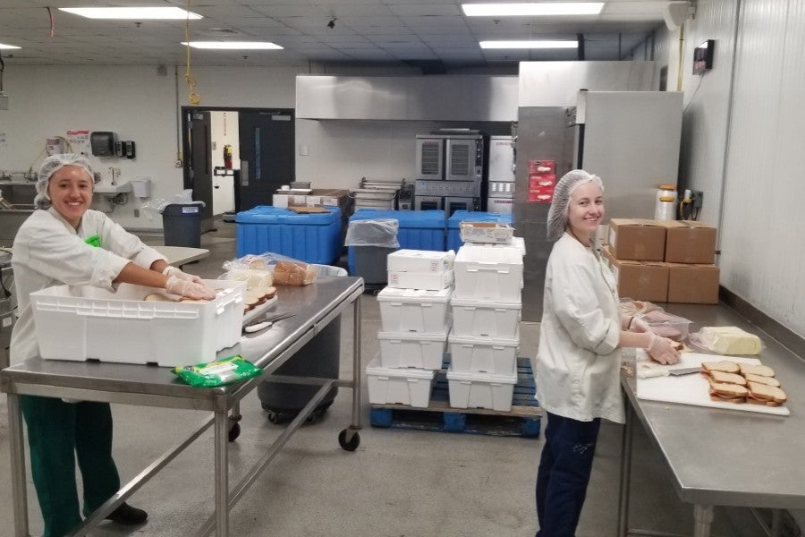 Dietetic interns making A LOT of sandwiches in the Second Harvest kitchen