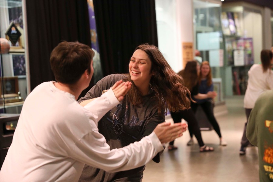 Students rehearse for 'Short Sighted" in Allen Arena lobby.