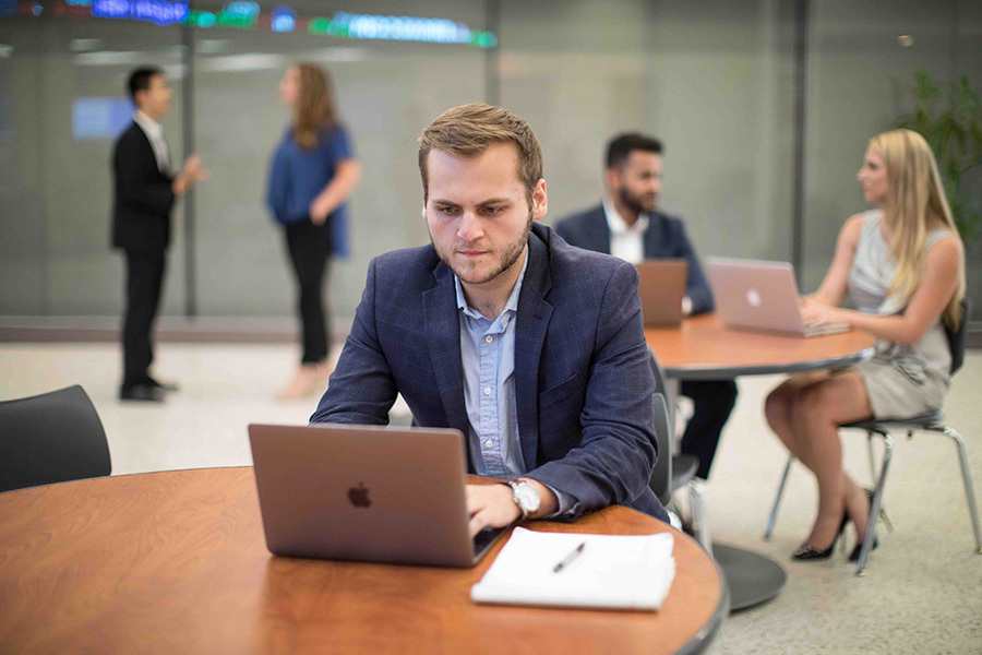 Graduate students working on campus