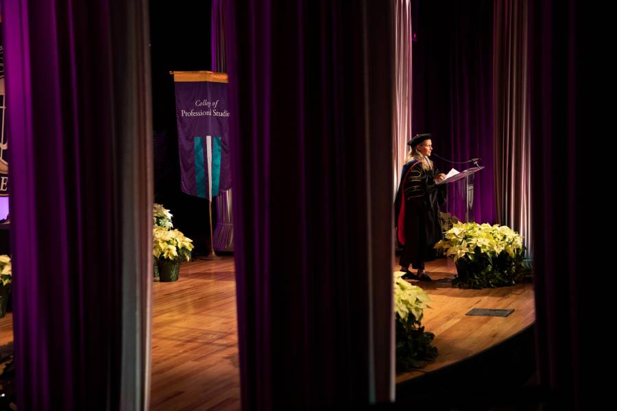 Catherine Terry reads graduate names.