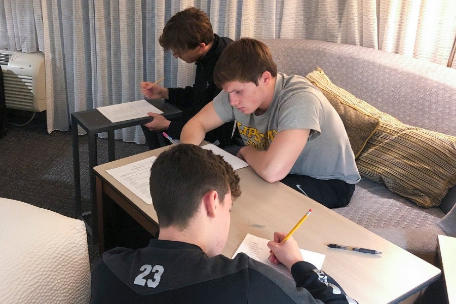 Athletes studying in hotel