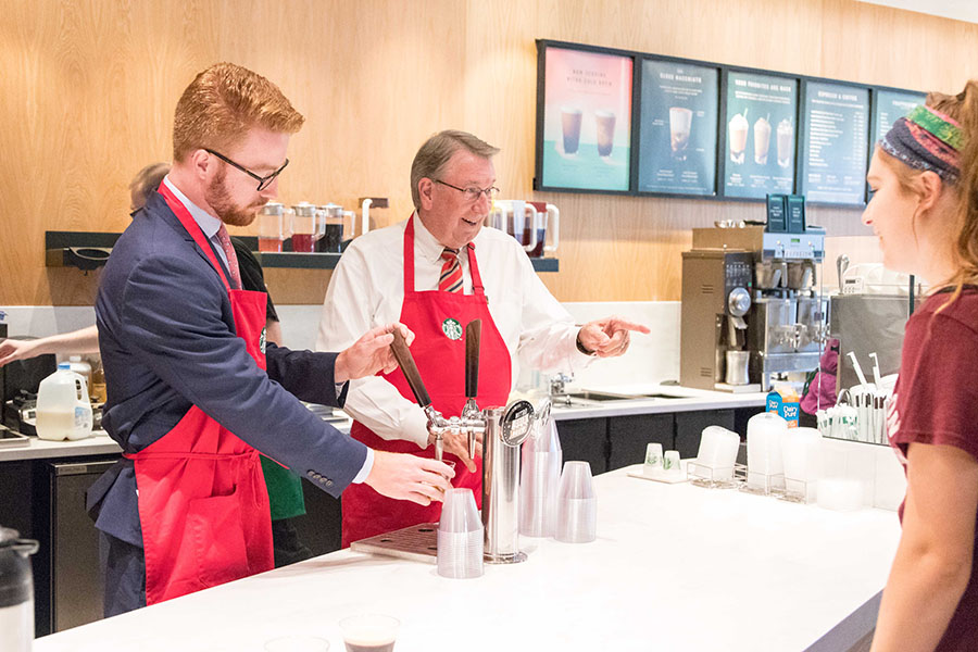 Lowry serves coffee in Starbucks