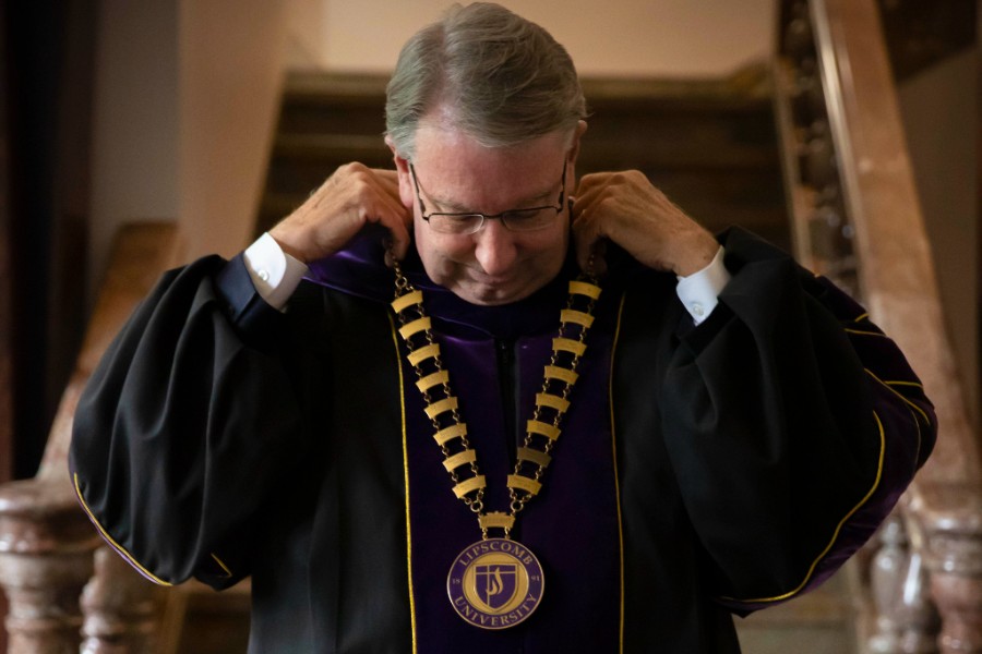 President Lowry dons the official medallion in May 2021