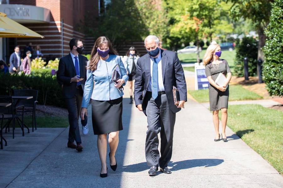 Dr. McQueen walks with Provost Craig Bledsoe