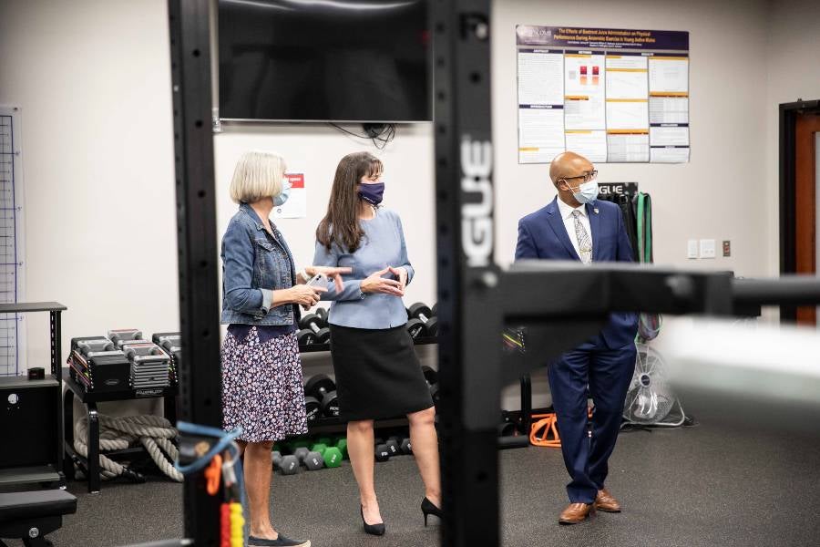 Dr. McQueen tours the Hughes Center with Dr. Quincy Byrdsong